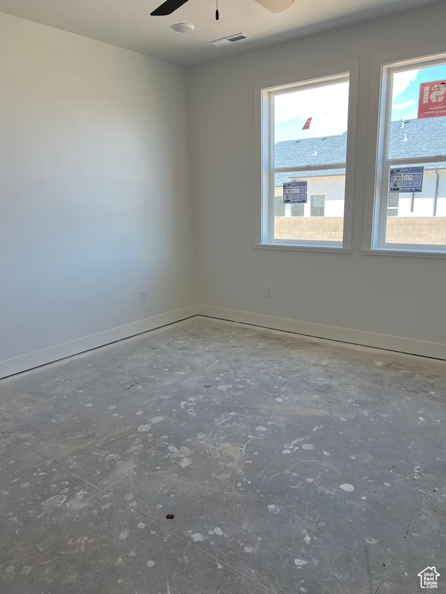 344 W Rosie Loop Unit 46E, Cedar City, UT 84721 - empty room featuring baseboards and a ceiling fan