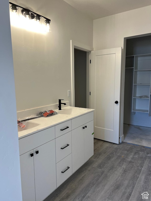 344 W Rosie Loop Unit 46E, Cedar City, UT 84721 - full bath with wood finished floors and double vanity