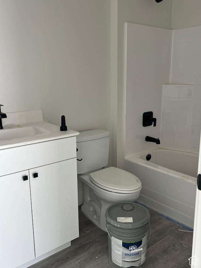 344 W Rosie Loop Unit 46E, Cedar City, UT 84721 - bathroom with wood finished floors, toilet, vanity, and shower / washtub combination