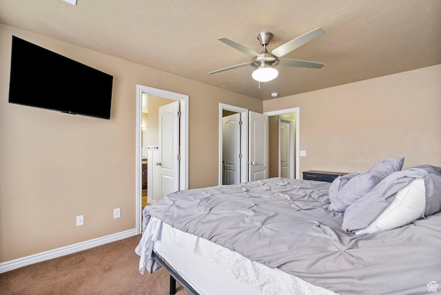 700 S Clearwater Falls Dr E, Layton, UT 84041 - bedroom with connected bathroom, light carpet, a textured ceiling, and ceiling fan