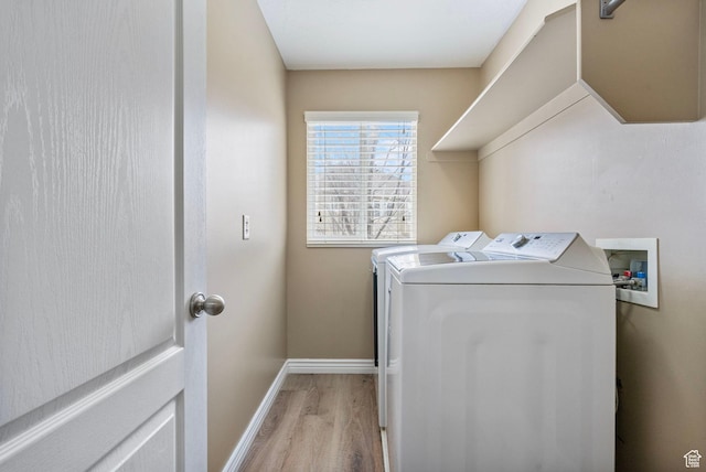 700 S Clearwater Falls Dr E, Layton, UT 84041 - laundry area with washing machine and dryer and light hardwood / wood-style floors