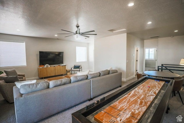 3780 Arcadia Dr Unit 51, Santa Clara, UT 84765 - living room with carpet, a healthy amount of sunlight, and a textured ceiling