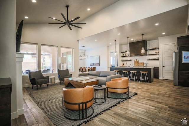 3780 Arcadia Dr Unit 51, Santa Clara, UT 84765 - living room with ceiling fan, hardwood / wood-style floors, and a high ceiling