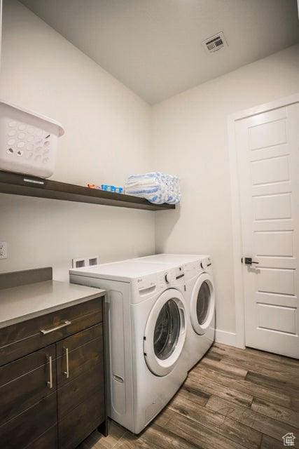 3780 Arcadia Dr Unit 51, Santa Clara, UT 84765 - laundry room with dark hardwood / wood-style flooring and washer and clothes dryer