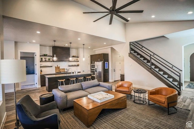 3780 Arcadia Dr Unit 51, Santa Clara, UT 84765 - living room featuring hardwood / wood-style flooring, high vaulted ceiling, and ceiling fan