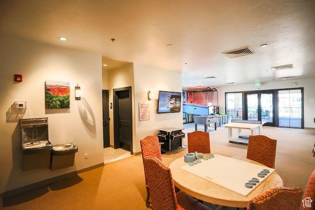 3780 Arcadia Dr Unit 51, Santa Clara, UT 84765 - carpeted dining room with french doors