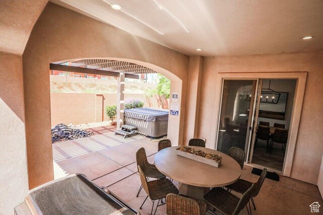 3780 Arcadia Dr Unit 51, Santa Clara, UT 84765 - view of patio / terrace featuring a hot tub