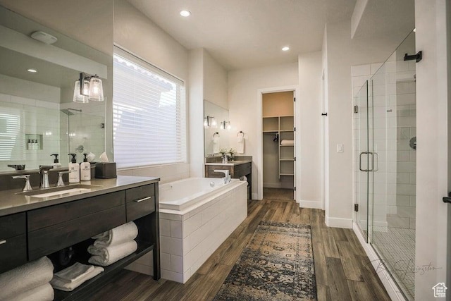 3780 Arcadia Dr Unit 51, Santa Clara, UT 84765 - bathroom with wood-type flooring, separate shower and tub, and vanity