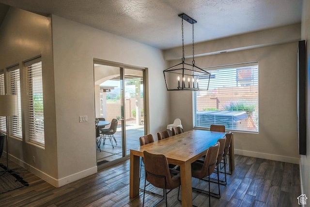 3780 Arcadia Dr Unit 51, Santa Clara, UT 84765 - dining space with dark hardwood / wood-style flooring, a textured ceiling, and a healthy amount of sunlight