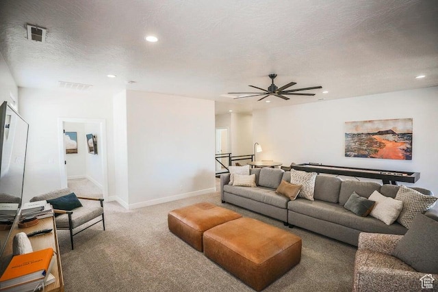 3780 Arcadia Dr Unit 51, Santa Clara, UT 84765 - carpeted living room featuring ceiling fan and a textured ceiling