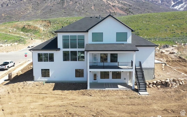 124 E 4100 N, North Ogden, UT 84414 - rear view of property featuring a mountain view and a patio area