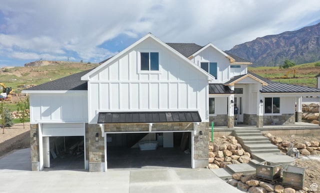 124 E 4100 N, North Ogden, UT 84414 - view of front of home featuring a mountain view and a garage