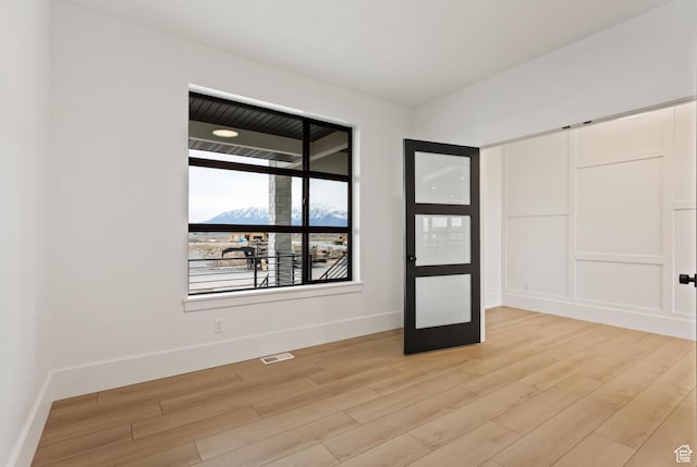 124 E 4100 N, North Ogden, UT 84414 - empty room featuring light hardwood / wood-style floors