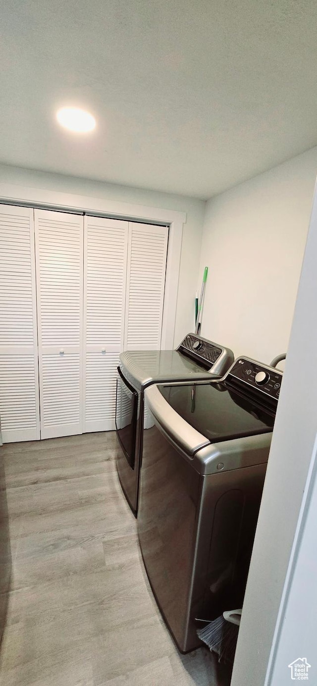 1600 W 4300 S, Salt Lake City, UT 84123 - laundry room with washer and clothes dryer and light wood finished floors