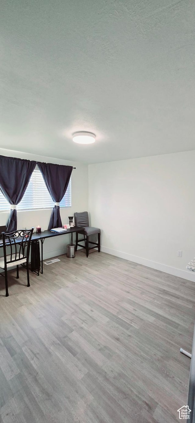 1600 W 4300 S, Salt Lake City, UT 84123 - living area with wood finished floors, baseboards, and a textured ceiling
