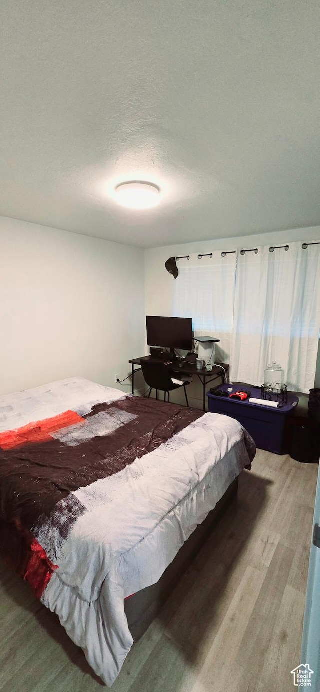 1600 W 4300 S, Salt Lake City, UT 84123 - bedroom featuring wood finished floors and a textured ceiling