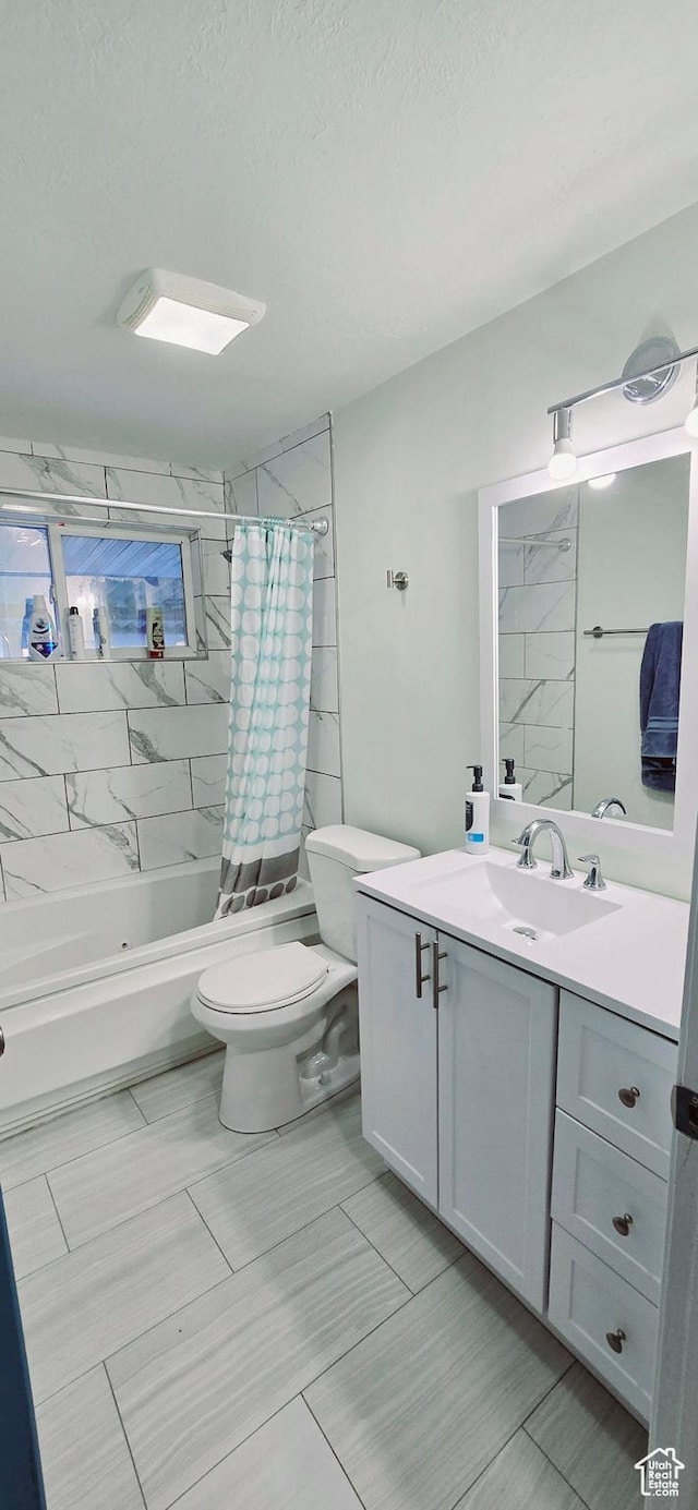 1600 W 4300 S, Salt Lake City, UT 84123 - full bath with toilet, vanity, shower / tub combo with curtain, and a textured ceiling