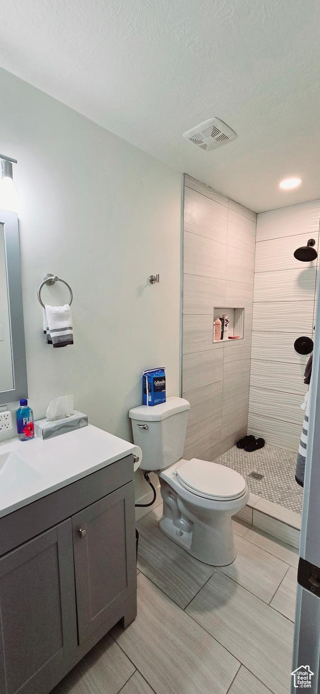 1600 W 4300 S, Salt Lake City, UT 84123 - bathroom with vanity, toilet, a shower stall, and a textured ceiling