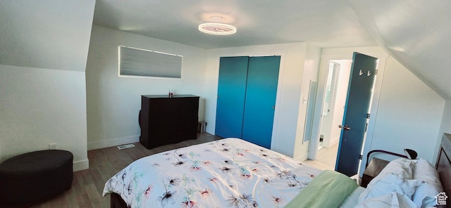1600 W 4300 S, Salt Lake City, UT 84123 - bedroom featuring wood finished floors, lofted ceiling, baseboards, and a closet