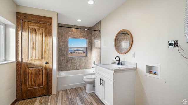 6668 S 3200 W, Spanish Fork, UT 84660 - bathroom with vanity, wood finished floors, toilet, bathtub / shower combination, and recessed lighting