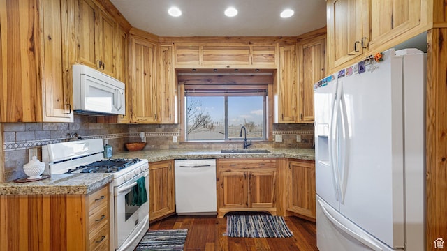 6668 S 3200 W, Spanish Fork, UT 84660 - kitchen with a sink, white appliances, dark wood finished floors, recessed lighting, and decorative backsplash