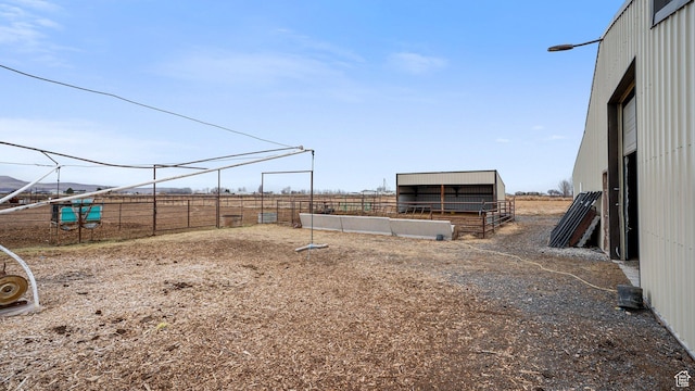 6668 S 3200 W, Spanish Fork, UT 84660 - view of yard with fence, an outbuilding, an outdoor structure, and an exterior structure