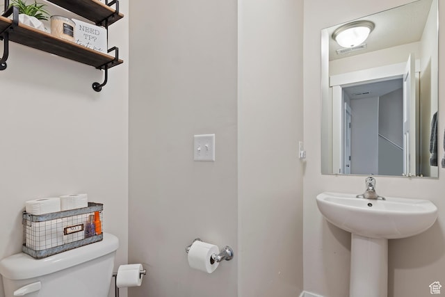 2390 W Jade Way Unit 2, West Haven, UT 84401 - half bath with toilet, visible vents, and a sink