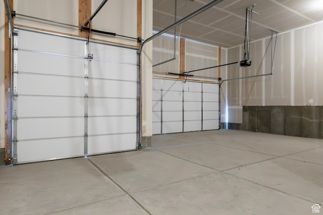 3047 N 2875 W Unit 7, Plain City, UT 84404 - garage featuring a garage door opener
