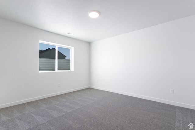 3047 N 2875 W Unit 7, Plain City, UT 84404 - empty room featuring carpet flooring and baseboards