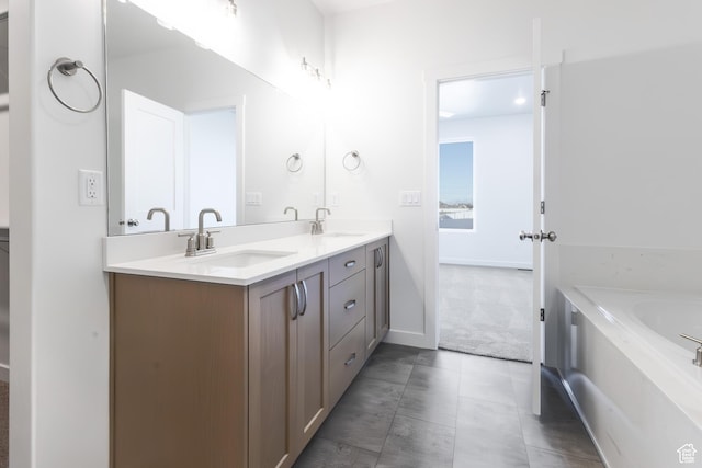3047 N 2875 W Unit 7, Plain City, UT 84404 - full bathroom featuring double vanity, a tub, and baseboards