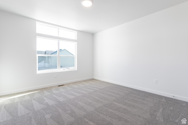 3047 N 2875 W Unit 7, Plain City, UT 84404 - carpeted empty room with baseboards
