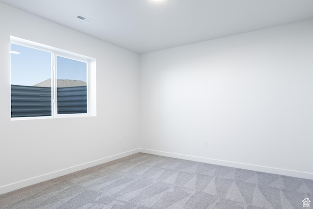 3047 N 2875 W Unit 7, Plain City, UT 84404 - empty room featuring carpet floors and baseboards