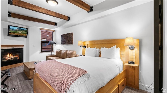 1476 Newpark Blvd Unit 302, Park City, UT 84098 - bedroom featuring wood-type flooring and beamed ceiling