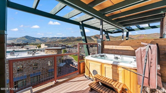 1476 Newpark Blvd Unit 302, Park City, UT 84098 - wooden deck with a mountain view, a pergola, and a hot tub