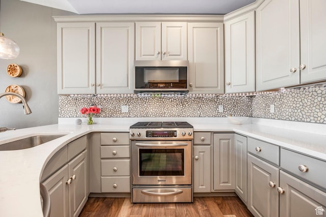 14084 N Council Fire Trl Unit 14D, Kamas, UT 84036 - kitchen with stainless steel appliances, sink, light hardwood / wood-style flooring, and gray cabinets