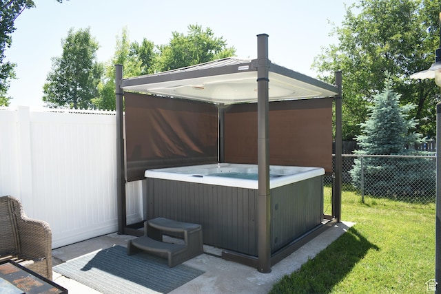 1797 N 700th St E, North Ogden, UT 84414 - view of patio / terrace with a hot tub