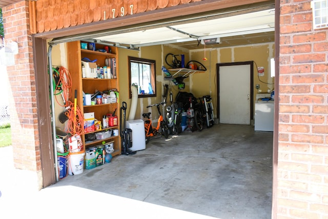 1797 N 700th St E, North Ogden, UT 84414 - garage with a garage door opener and washer / clothes dryer