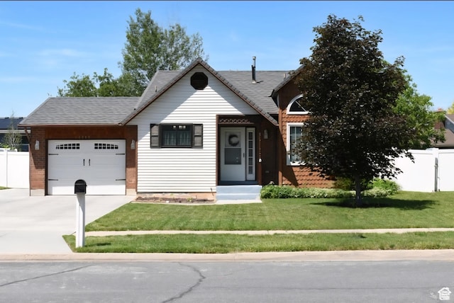 1797 N 700th St E, North Ogden, UT 84414 - view of front of house with a garage and concrete driveway