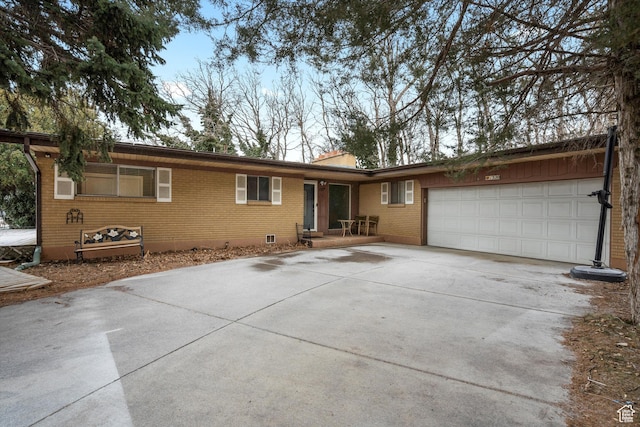 1320 Country Hills Dr, Ogden, UT 84403 - ranch-style house with a garage