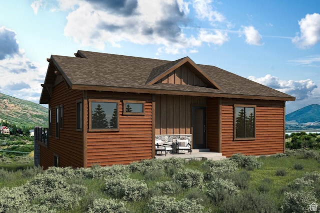 11746 N Star Gazer Cir Unit 108, Hideout, UT 84036 - back of property featuring a mountain view and a patio