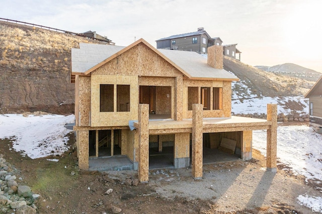 11746 N Star Gazer Cir Unit 108, Hideout, UT 84036 - snow covered rear of property featuring a mountain view