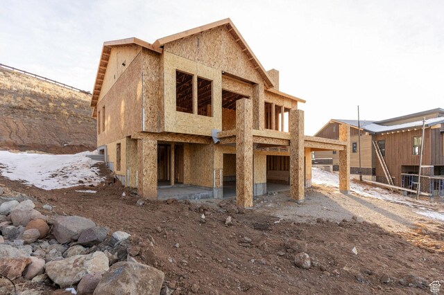 11746 N Star Gazer Cir Unit 108, Hideout, UT 84036 - view of snow covered rear of property