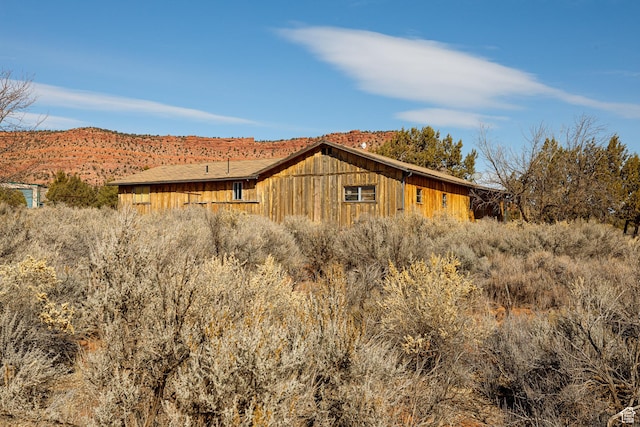 view of home's exterior featuring a mountain view