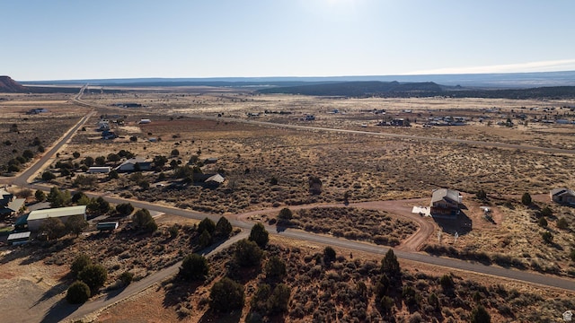 aerial view featuring a mountain view and a rural view