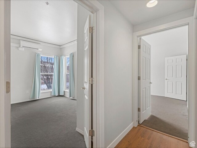 900 Bitner Rd Unit K17, Park City, UT 84098 - corridor featuring carpet flooring and a wall mounted AC