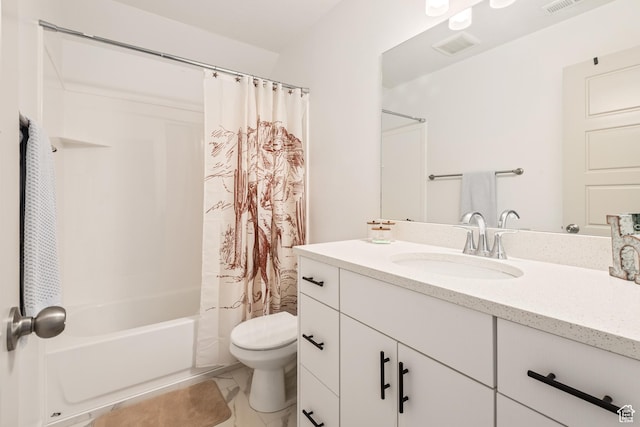 full bathroom featuring vanity, toilet, and shower / bath combo