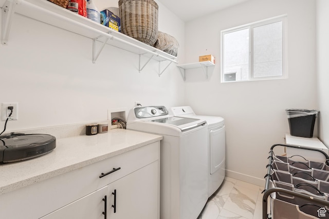 washroom featuring washer and dryer