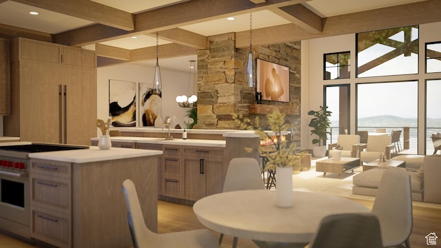 460 E Big Dutch Dr, Heber City, UT 84032 - kitchen featuring stainless steel stove, light brown cabinetry, beamed ceiling, hanging light fixtures, and a mountain view