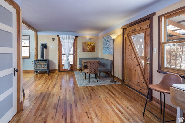 232 E 100 S, Moab, UT 84532 - sitting room with hardwood / wood-style floors and a wood stove