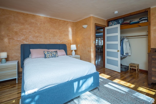232 E 100 S, Moab, UT 84532 - bedroom with dark hardwood / wood-style flooring and a closet